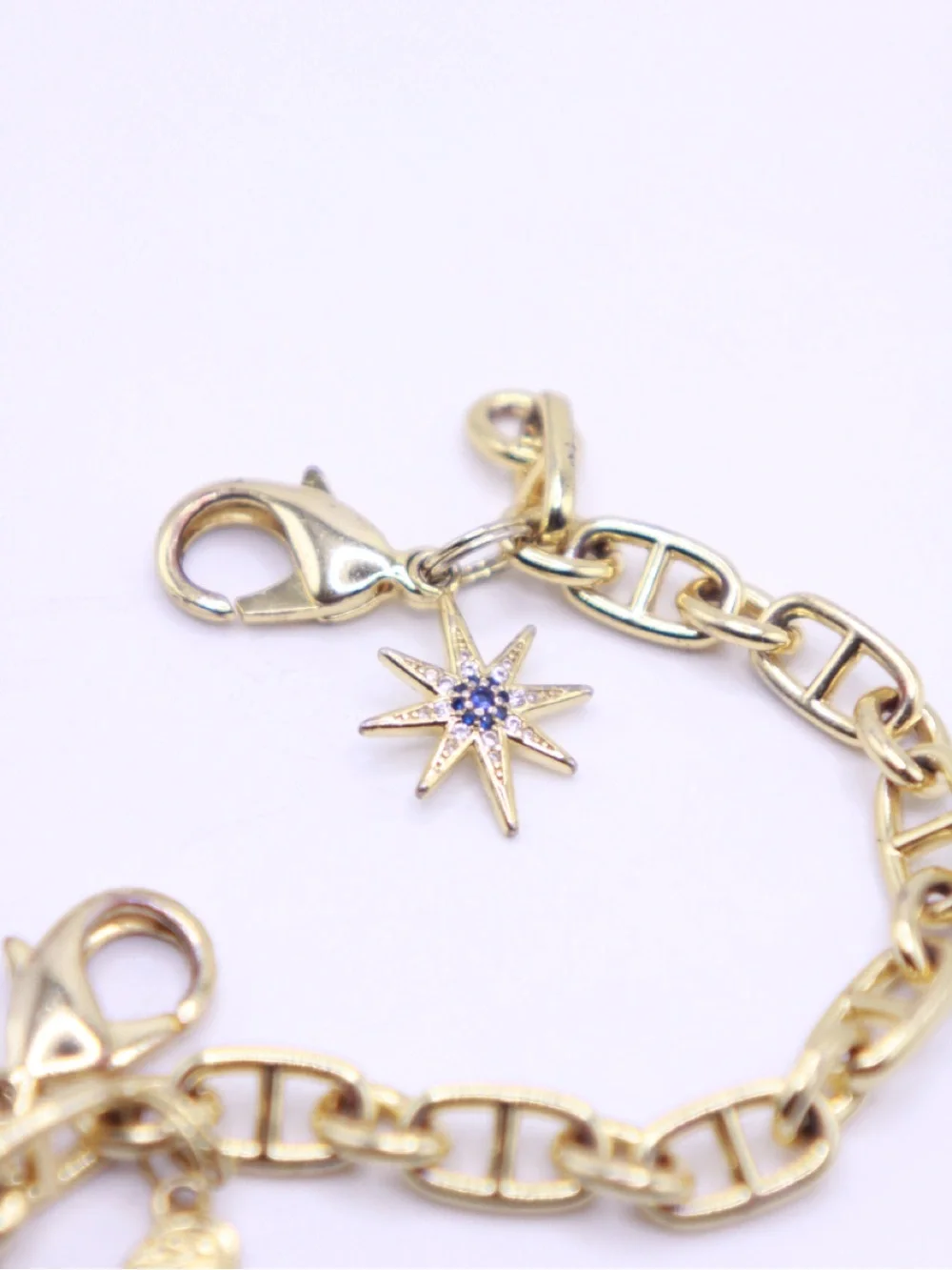 Bandolier Gold-Tone Charm Wristlet Bracelet with Star, Wing & Disc Charms - Picture 4 of 5